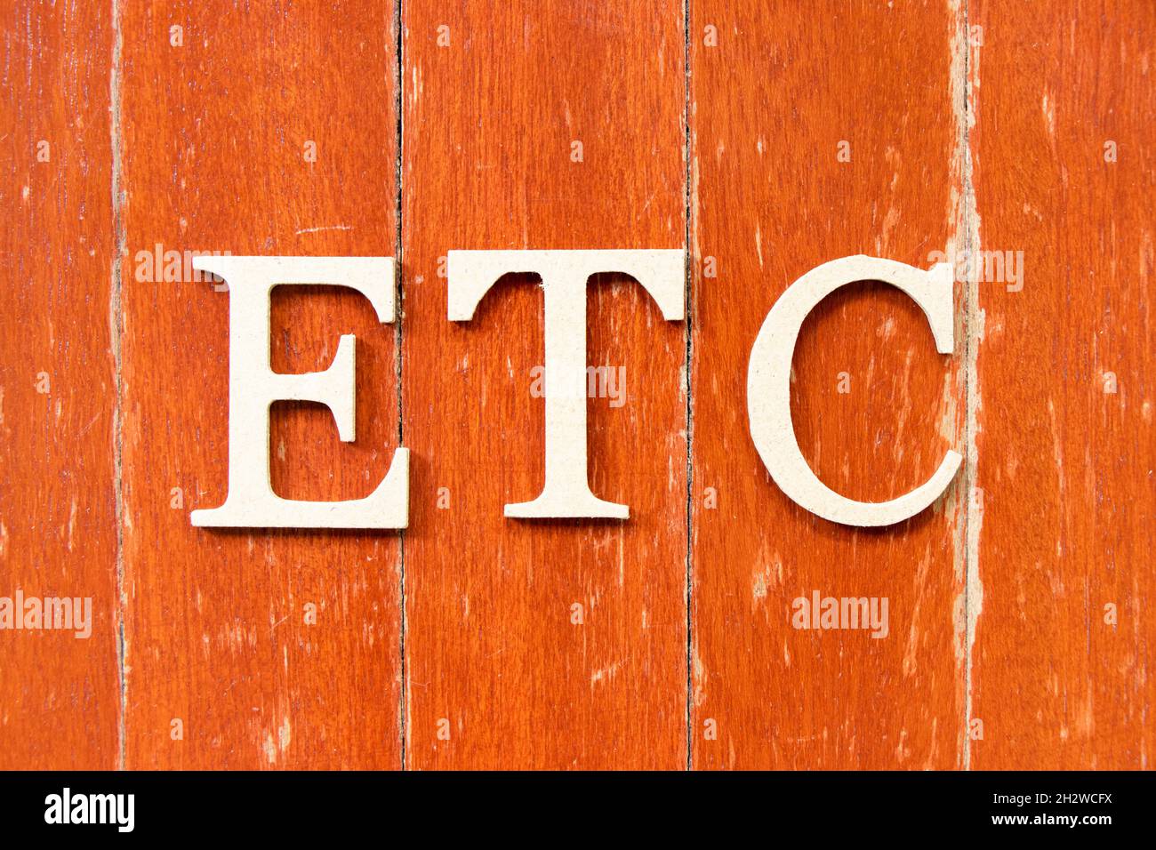 Alphabet letter in word etc (abbreviation of et cetera) on old red