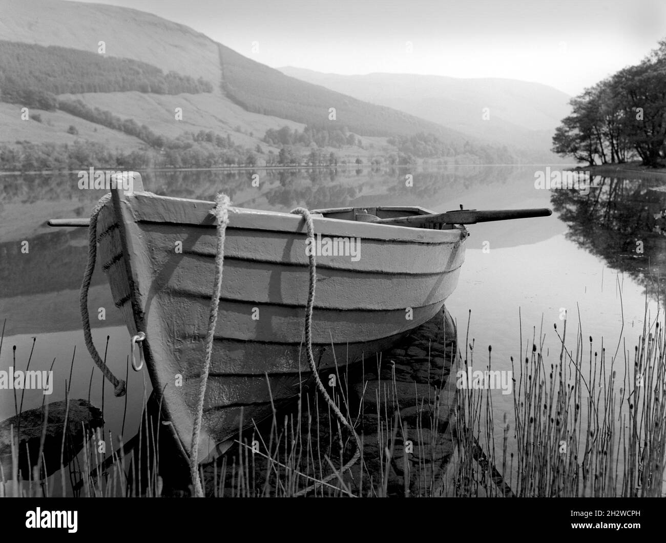 Wooden rowing boat at Muirlaggan, Loch Voil, nr Balquhidder, Perthshire, Scotland, UK Stock Photo