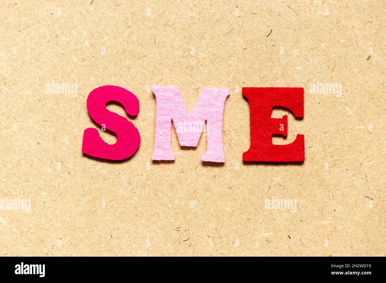 Color cloth alphabet letter in word SME (abbreviation of Small and ...