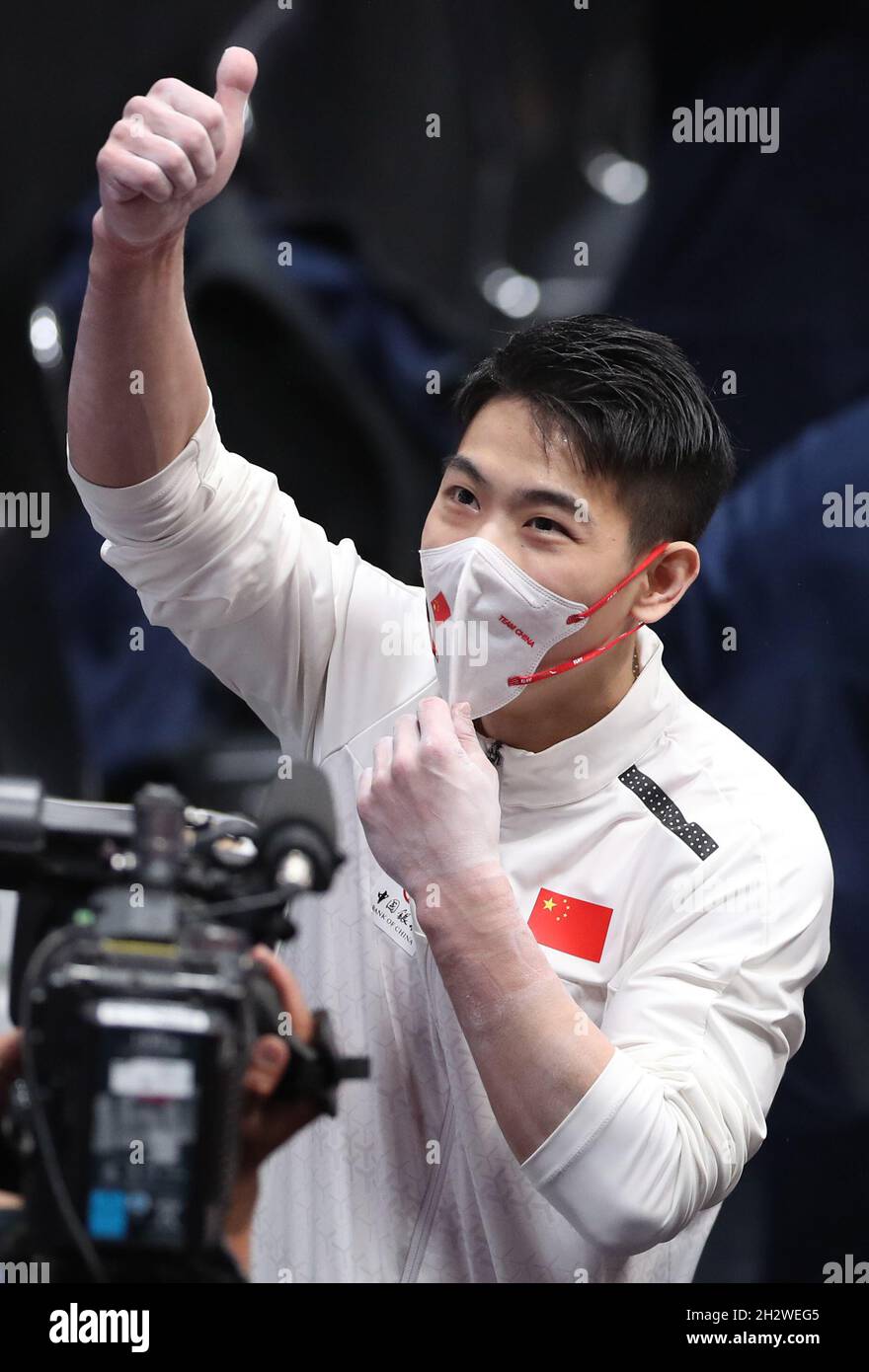 Kitakyushu, Japan. 24th Oct, 2021. Hu Xuwei of China celebrates after