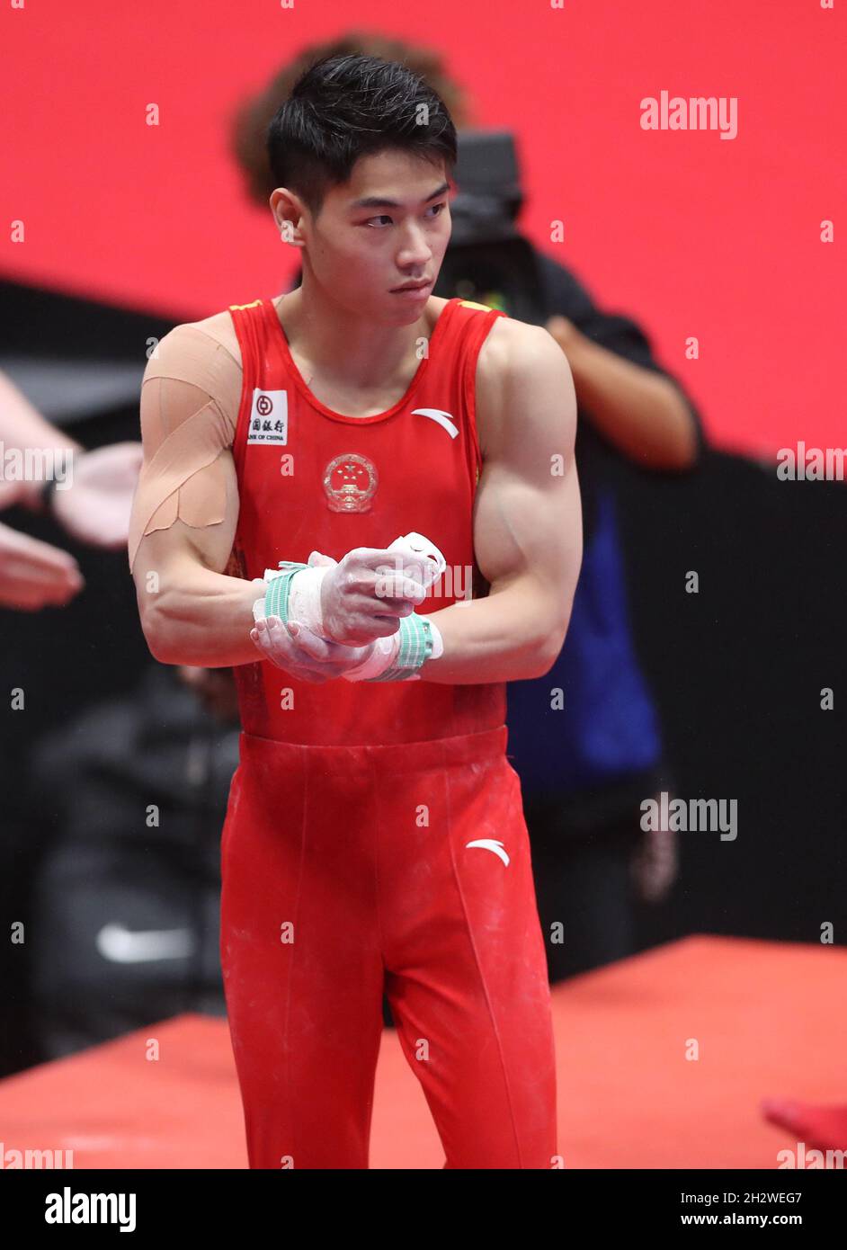 Kitakyushu, Japan. 24th Oct, 2021. Hu Xuwei of China reacts prior to