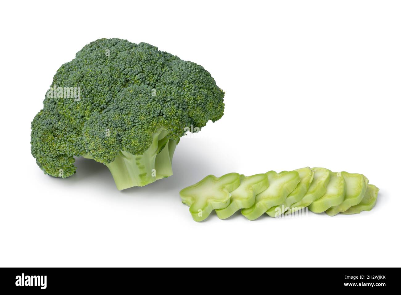 Fresh raw broccoli and a chopped stem isolated on white background Stock Photo