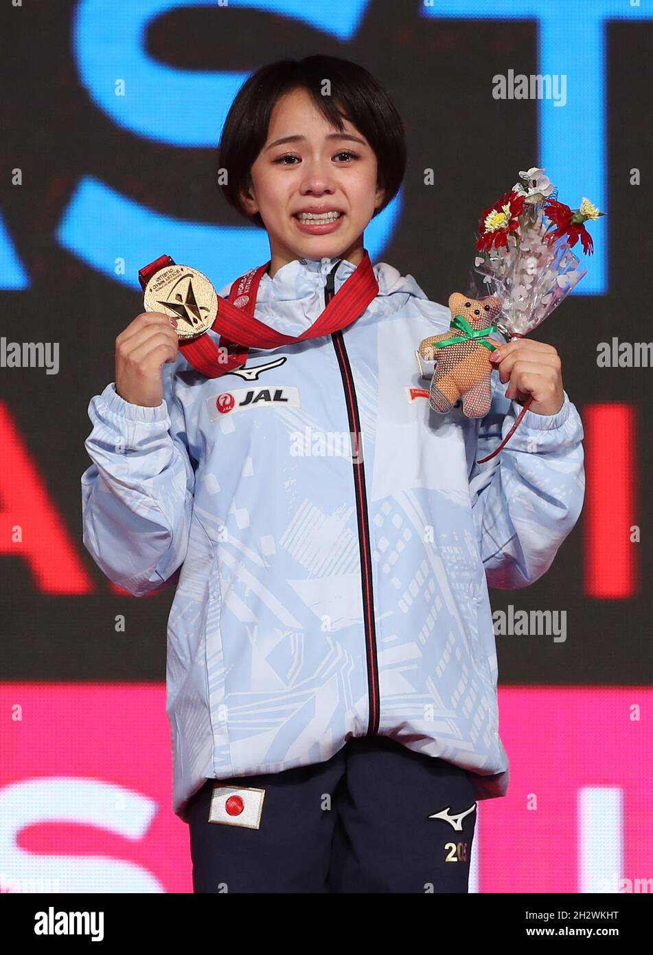 (211024) -- , Oct. 24, 2021 (Xinhua) -- Murakami Mai of Japan attends the awarding ceremony of the women's floor final at the 50th FIG Artistic Gymnastics World Championships in Kitakyushu, Japan, Oct. 24, 2021. (Xinhua/Du Xiaoyi) Stock Photo