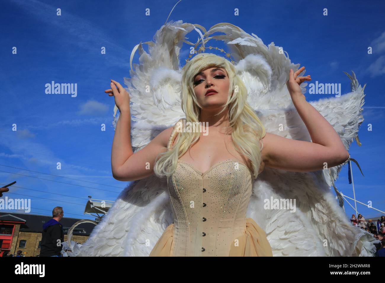 ExCel, London, UK. 24th Oct, 2021. A fan poses as Ryo from Devilman Crybaby. Cosplayers and fans of anime, sci-fi, games, and all things pop culture once again descend on the ExCel exhibition centre in London for MCM Comic Con London on its last day. Credit: Imageplotter/Alamy Live News Stock Photo