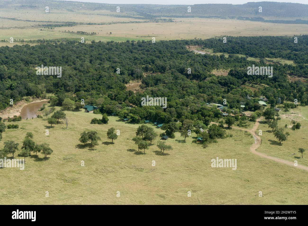 Aerial view of Governors Camp amongst trees, Masai Mara, Kenya Stock Photo