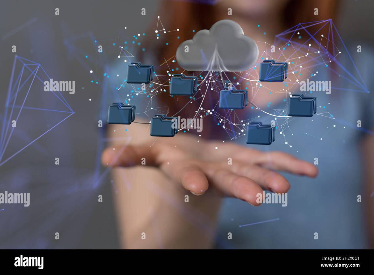 A female's hand holding augmented analytics data cloud storage network Stock Photo