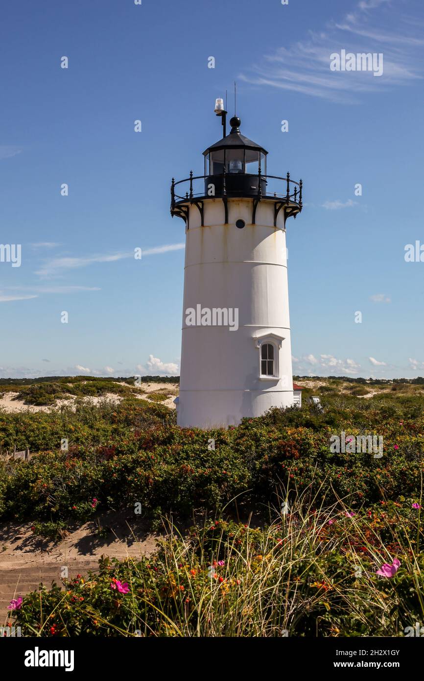 PROVINCETOWN, MASSACHUSETTS, USA - SEPTEMBER 15, 2014: Race Point lighthouse with blue sky in sunny day Stock Photo