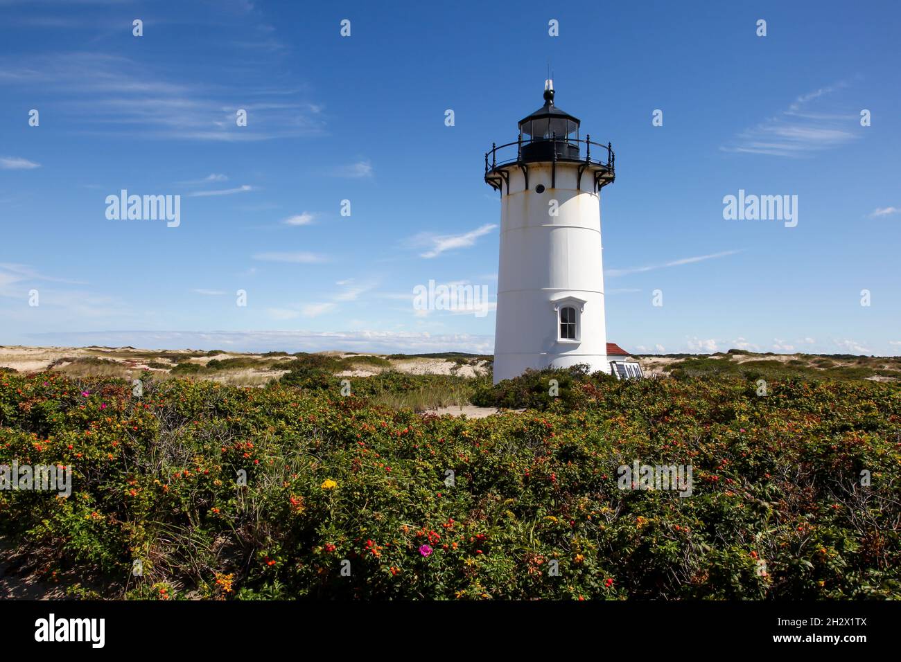 PROVINCETOWN, MASSACHUSETTS, USA-SEPTEMBER 15, 2014 : Race Point lighthouse with blue sky Stock Photo