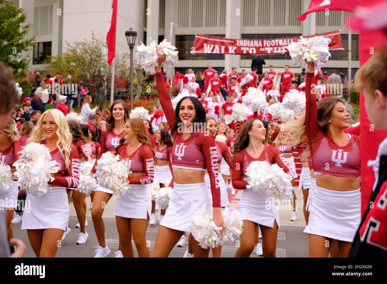 BLOOMINGTON, UNITED STATES - 2021/10/23: Indiana University’s Redsteppers cheer on the steps to Assembly Hall before IU plays Ohio State during an NCAA football game on October 16, 2021 at Memorial Stadium in Bloomington, Ind. Ohio State beat Indiana University 54-7. Stock Photo