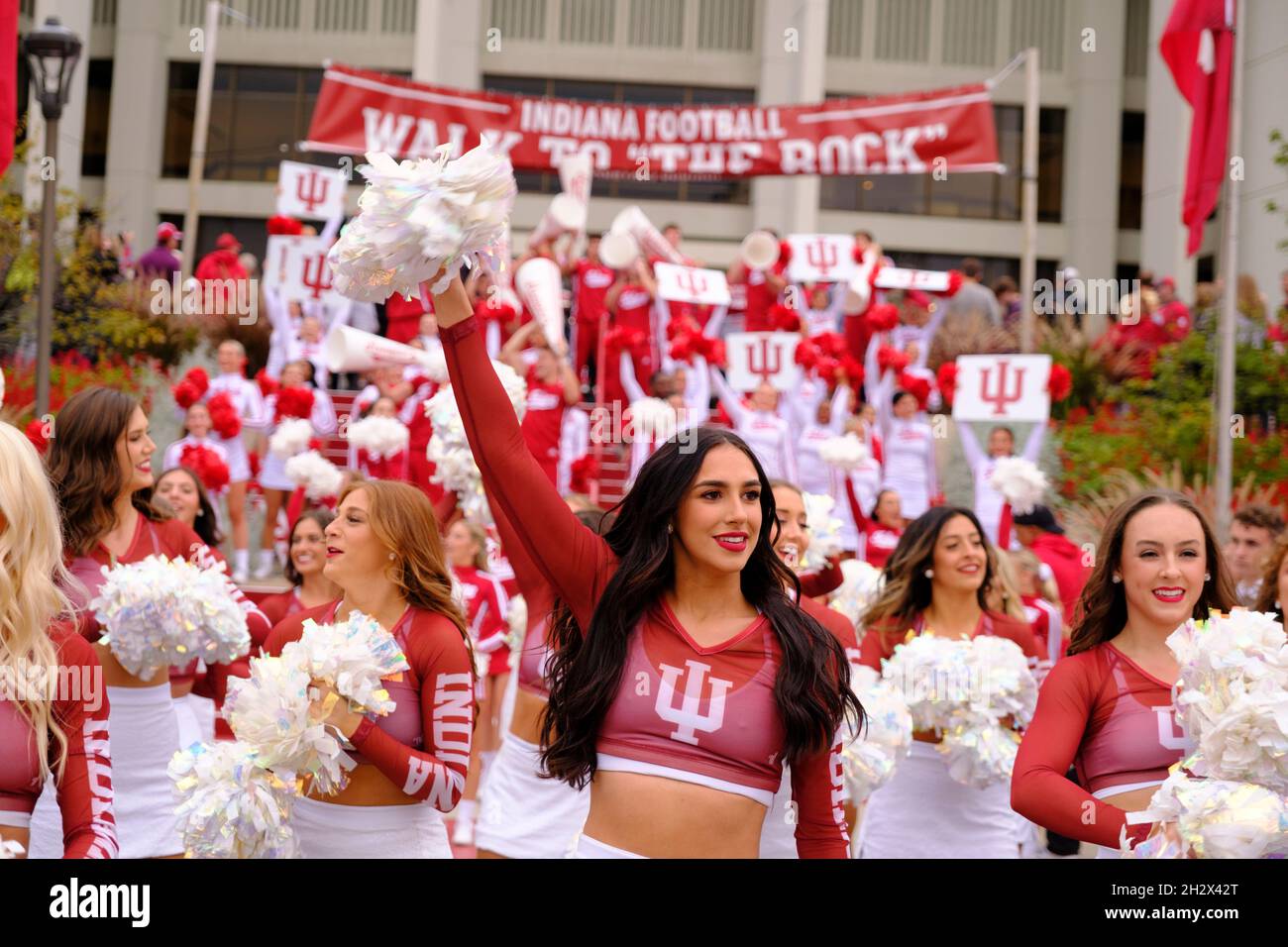 BLOOMINGTON, UNITED STATES - 2021/10/23: Indiana University’s Redsteppers cheer on the steps to Assembly Hall before IU plays Ohio State during an NCAA football game on October 16, 2021 at Memorial Stadium in Bloomington, Ind. Ohio State beat Indiana University 54-7. Stock Photo