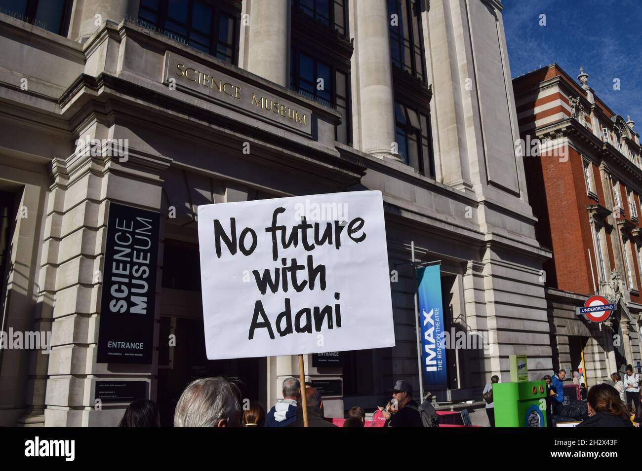 London, UK. 24th Oct, 2021. An activist holds a 'No Future With Adani' placard during the protest outside the Science Museum. Extinction Rebellion activists gathered outside the museum in South Kensington in protest against the museum's 'greenwash' sponsorship by fossil fuel companies including Shell and coal giants Adani. (Photo by Vuk Valcic/SOPA Images/Sipa USA) Credit: Sipa USA/Alamy Live News Stock Photo