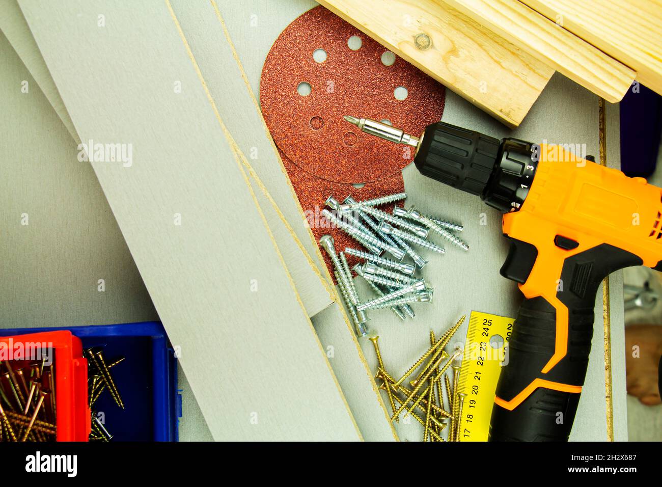 tools for repair and construction. Screwdriver, furniture screws