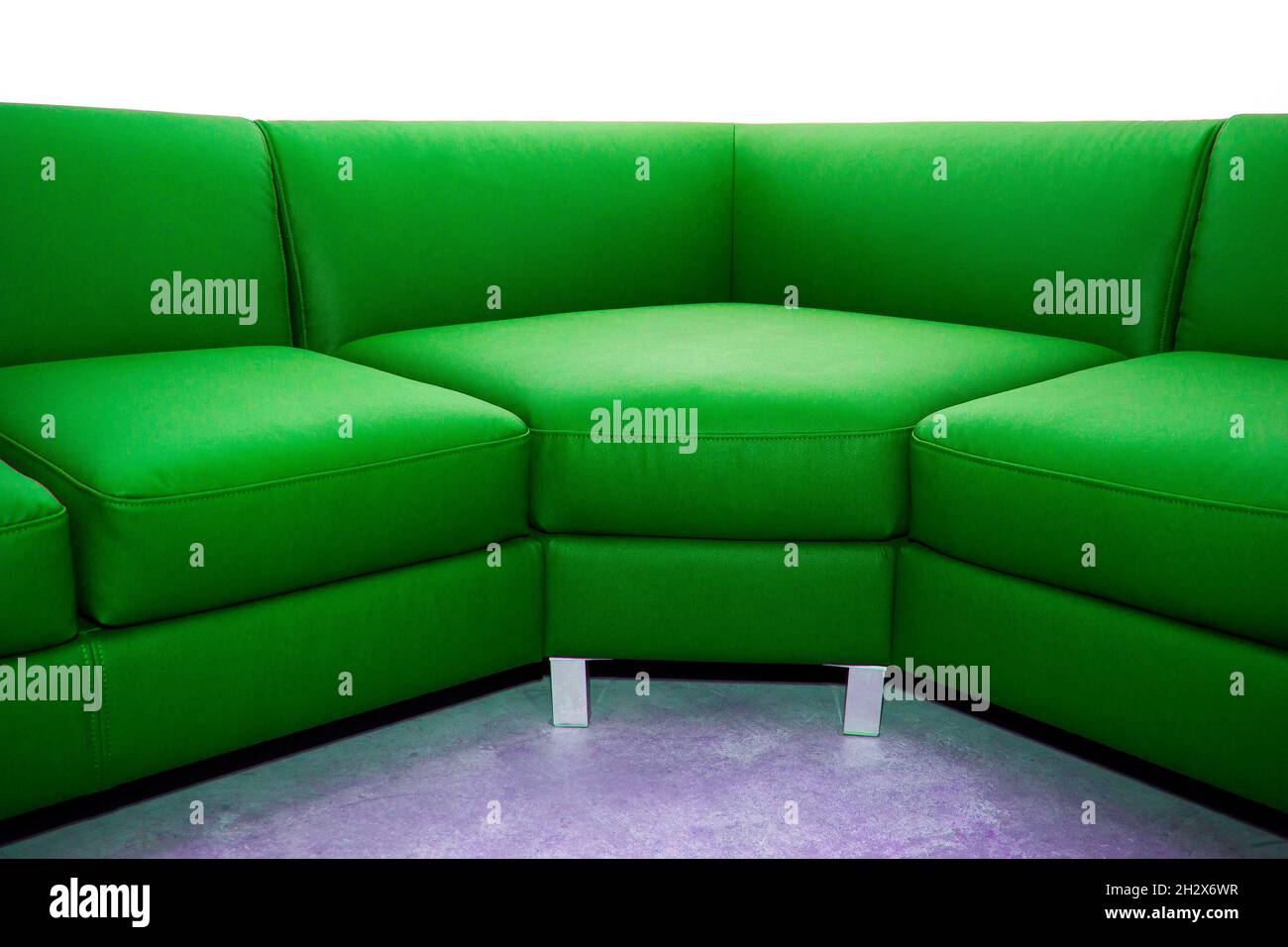 Corner folding sofa upholstered in leatherette, insulated on a white background Stock Photo