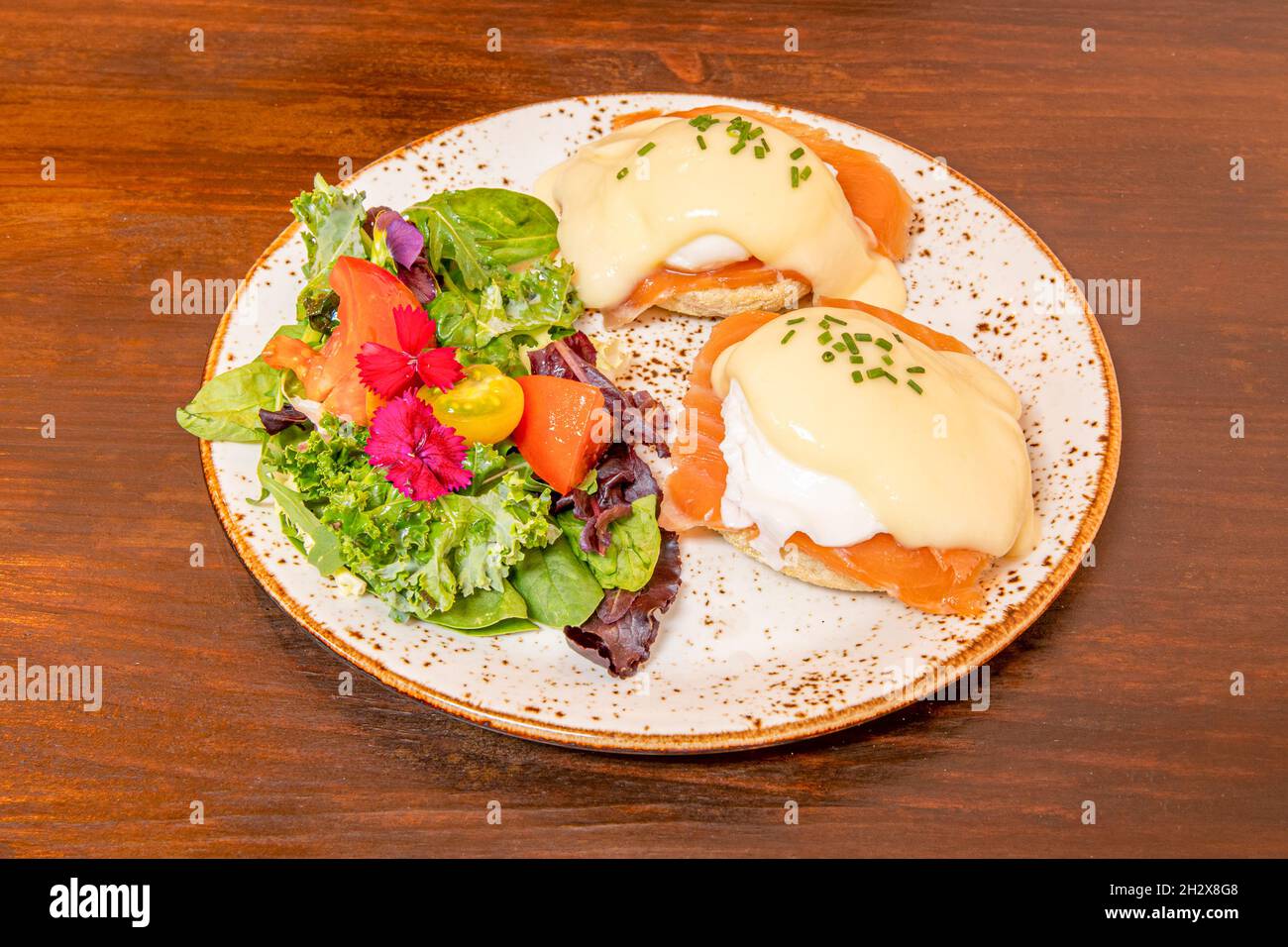 Eggs Benedict AngloSaxon dish consisting of two halves of an English