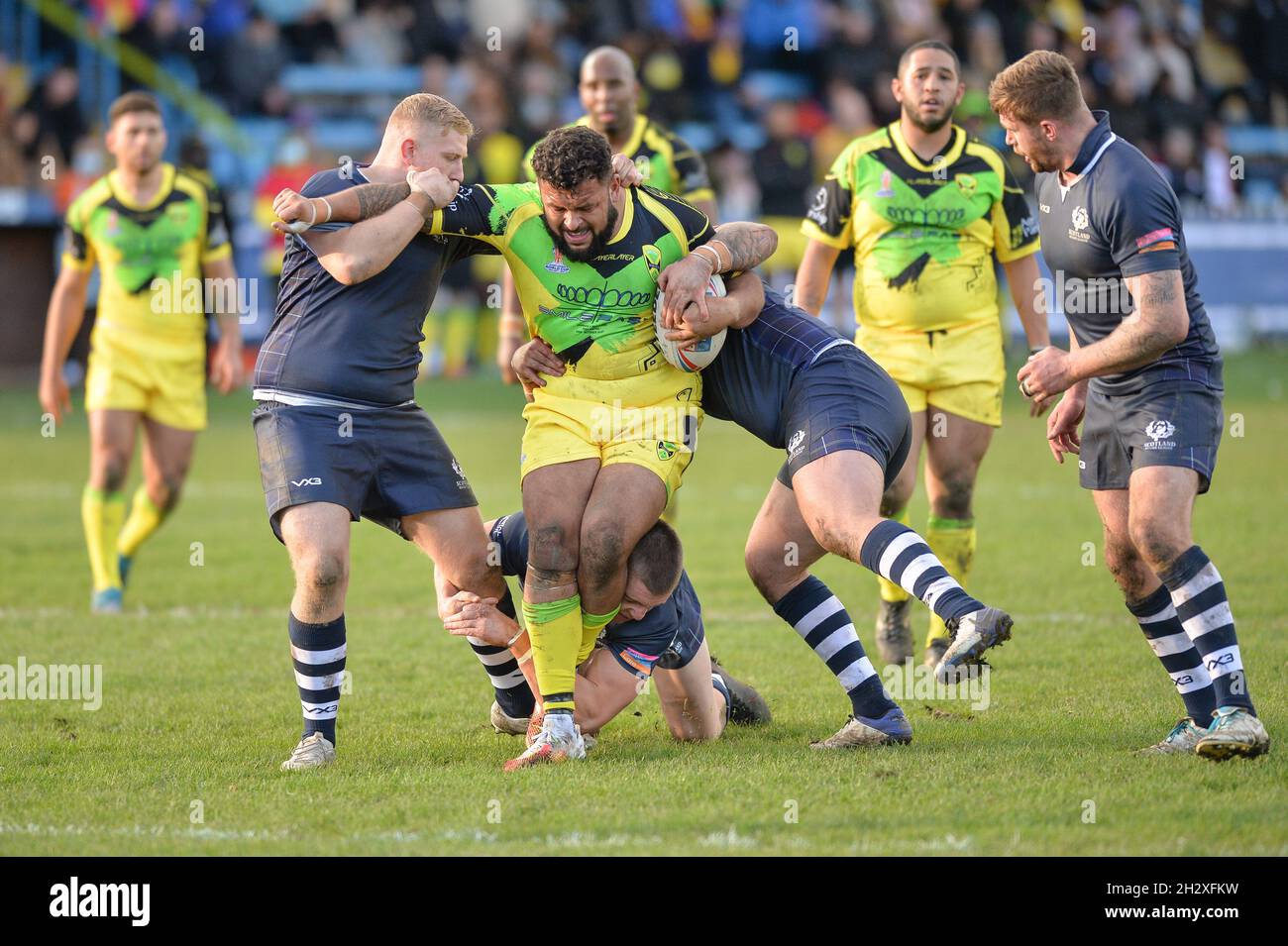 Featherstone, England - 24 October 2021 -  Jordan Andradre of Jamaica drives forward during the Rugby League  International  Jamaica vs Scotland at Millenium Stadium, Featherstone, UK  Dean Williams Stock Photo