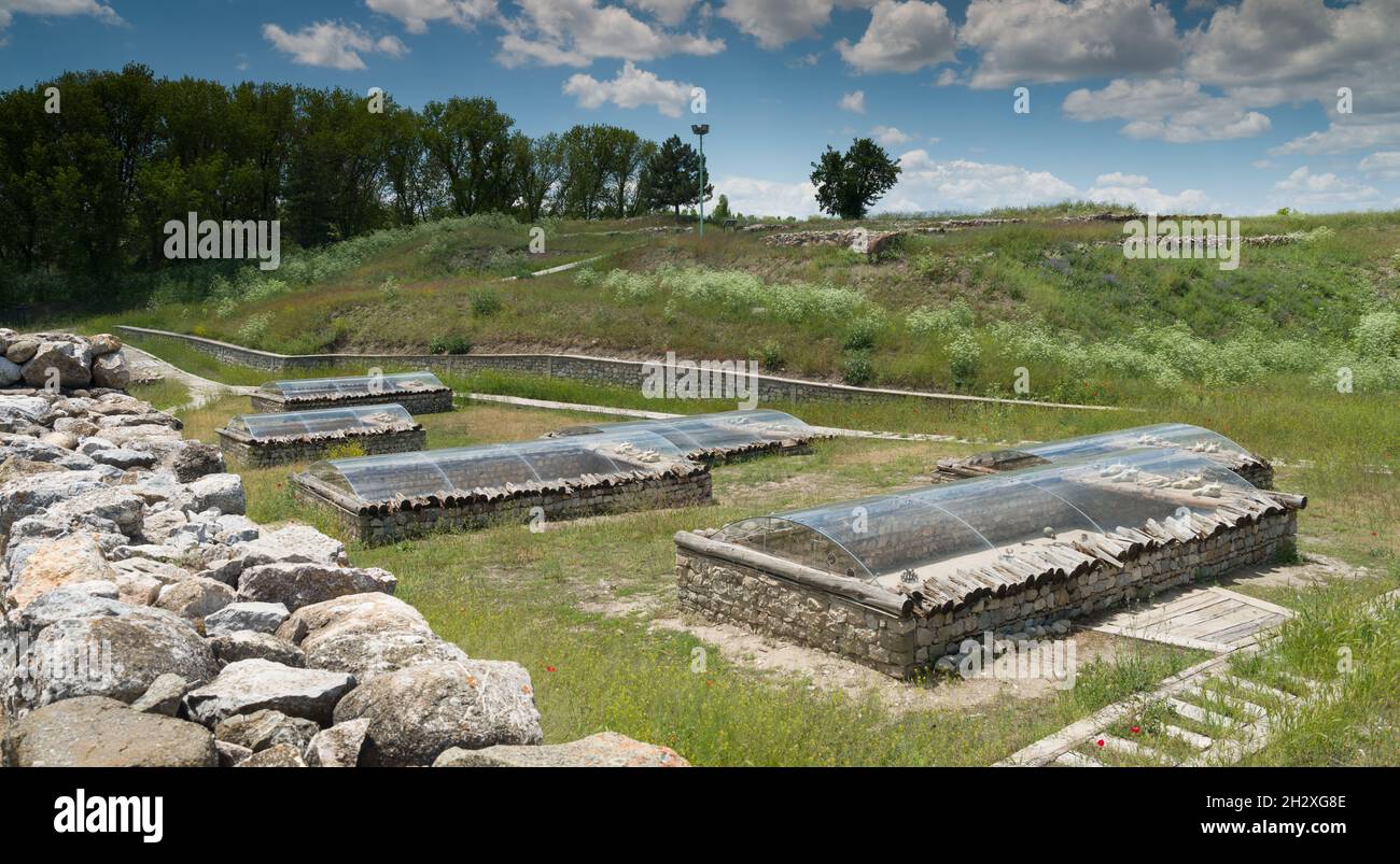 Alacahoyuk ruins in Corum. Interior view of tombs from Bronze and Hittite period. Human bones, tools and items. Stock Photo