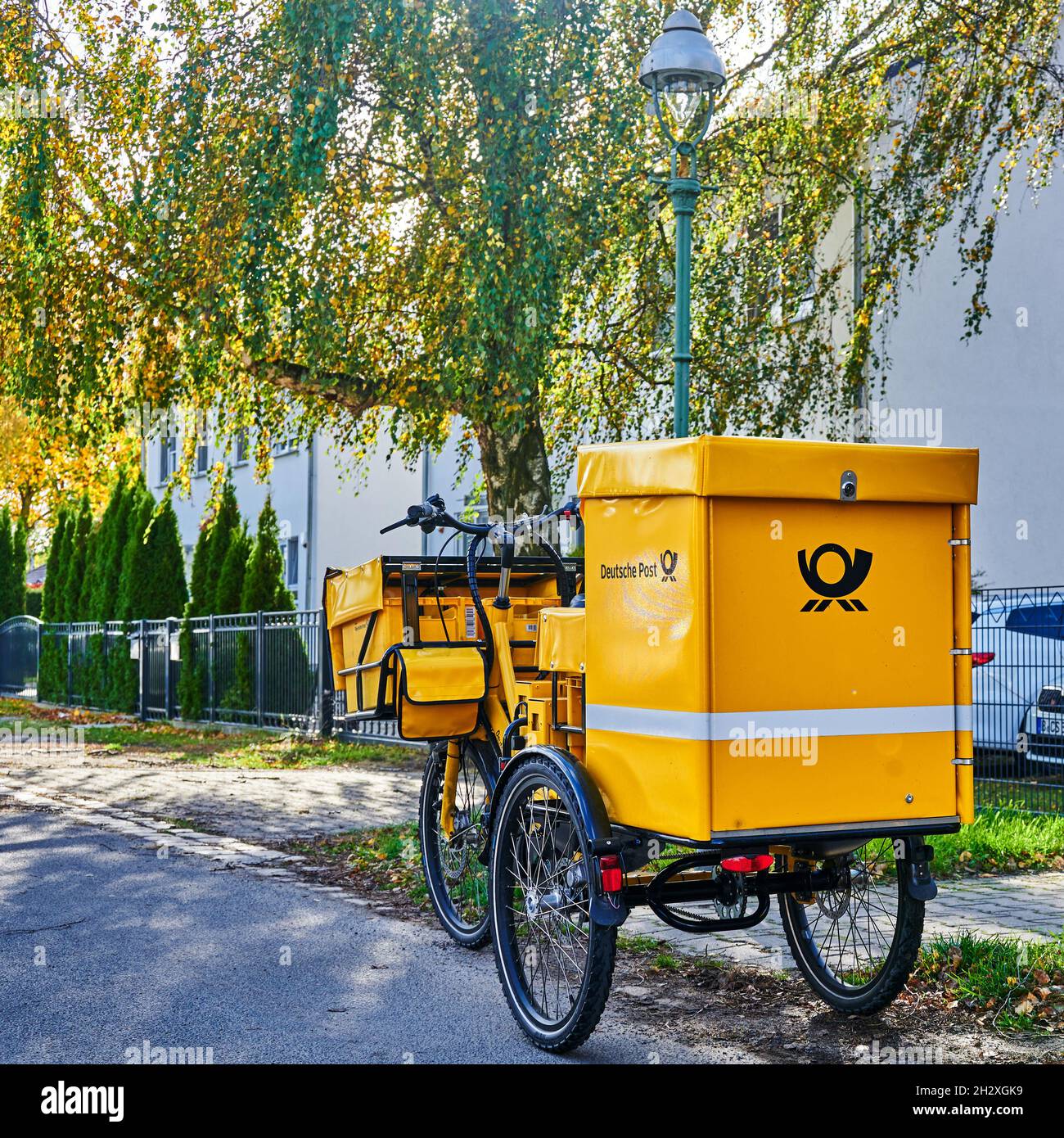 Berlin, Germany - October 23, 2021: Electric tricycle from the company  Deutsche Post on a street near the urban fringe of Berlin Stock Photo -  Alamy