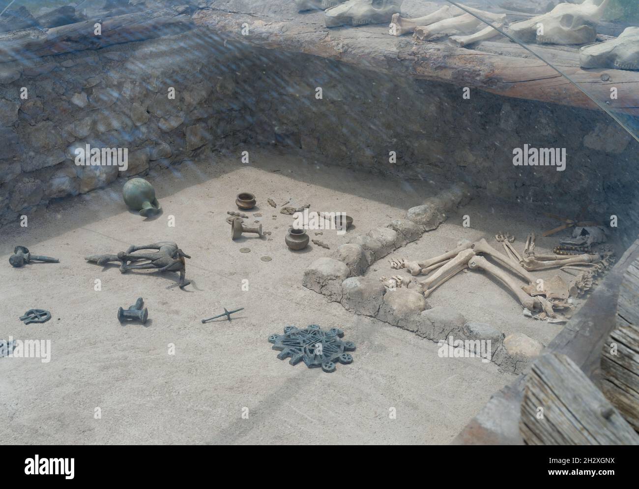 Alacahoyuk ruins in Corum. Interior view of tombs from Bronze and Hittite period. Human bones, tools and items. Stock Photo