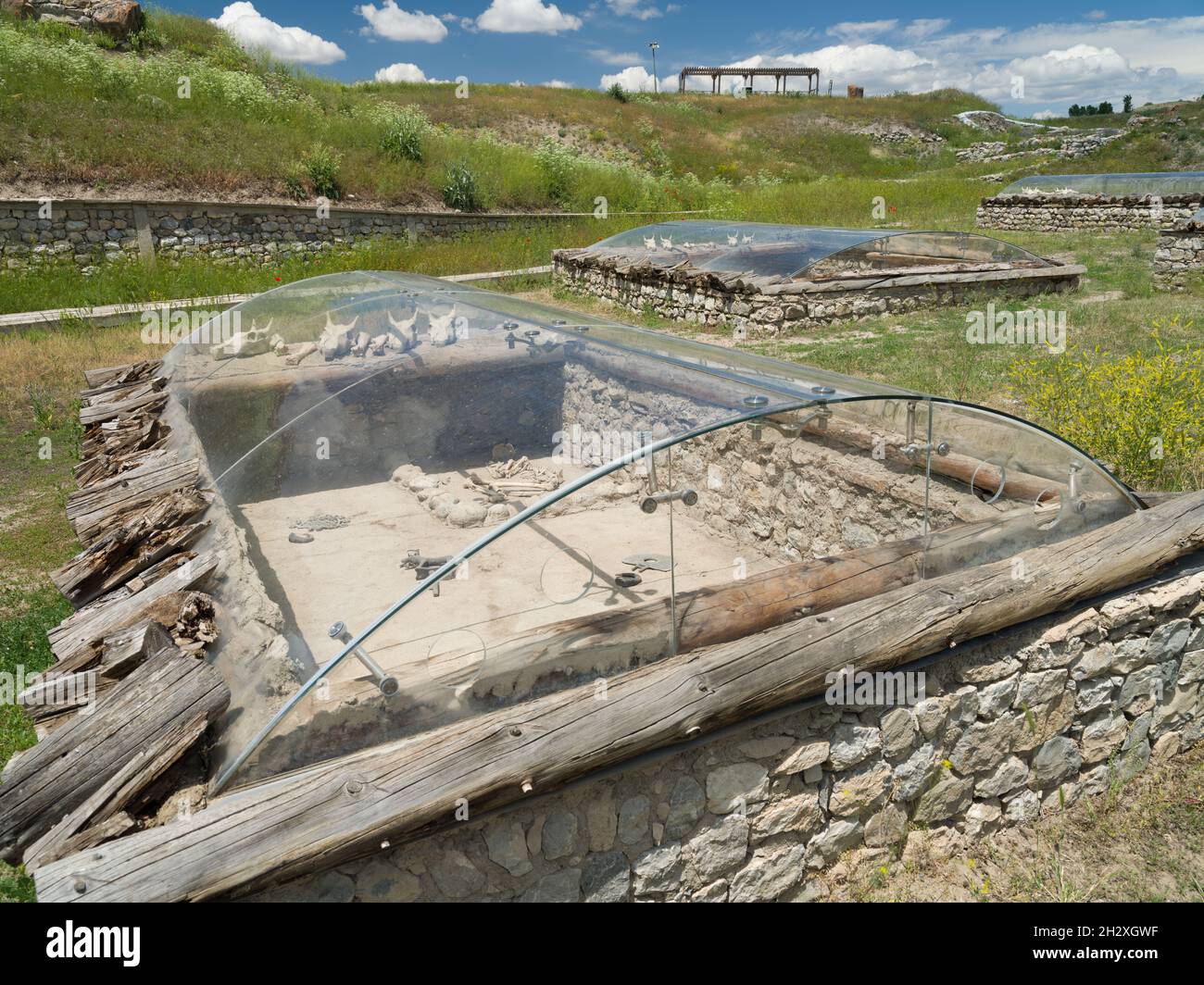 Alacahoyuk ruins in Corum. Interior view of tombs from Bronze and Hittite period. Human bones, tools and items. Stock Photo