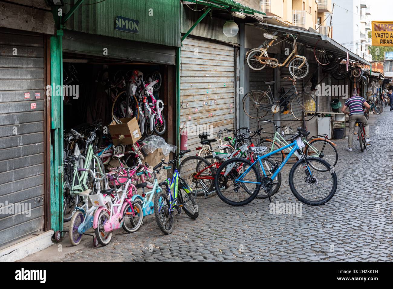 Used second-hand bicycles for sale at one of the Clivio Portuense garages in Trastevere district of Rome, Italy Stock Photo