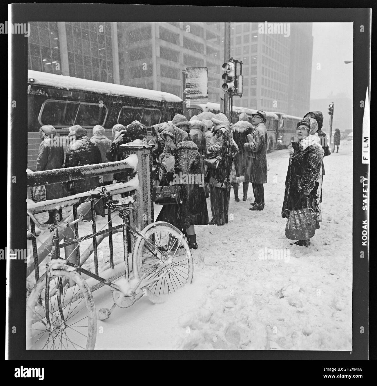 Commuters in snow storm on Michigan Avenue, Chicago, IL 1974. Stock Photo