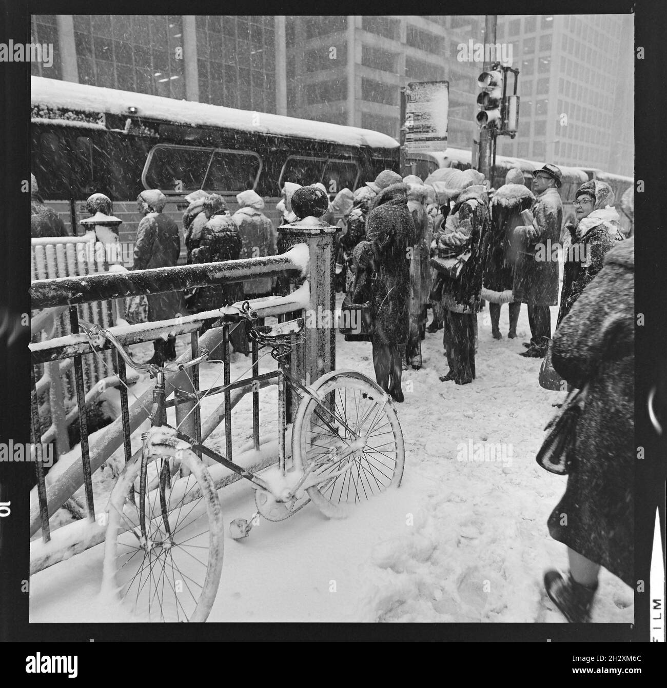 Commuters in snow storm on Michigan Avenue, Chicago, IL 1974. Stock Photo