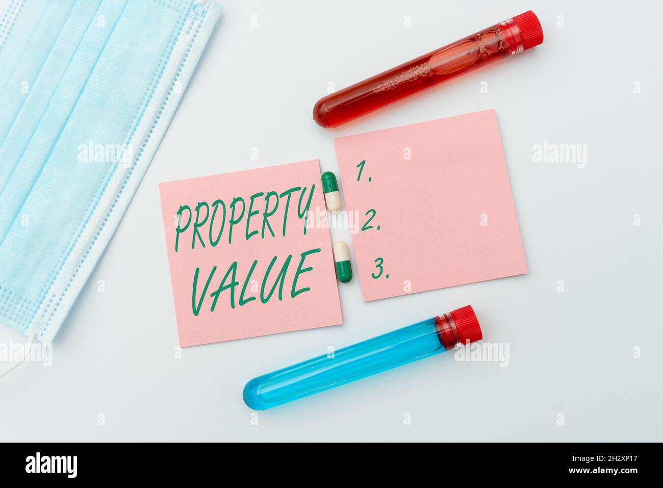 Handwriting text Property Value. Business showcase Worth of a land Real estate appraisal Fair market price Spreading Virus Awareness Message Stock Photo