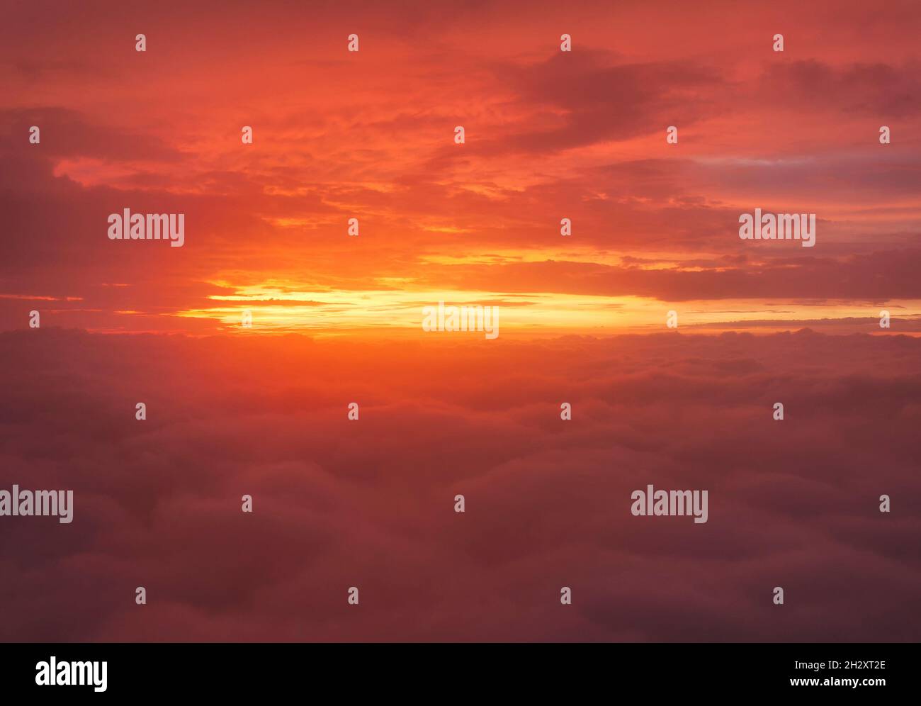 a sun rising over the clouds on top of emeishan on a sichuan province morning. Stock Photo
