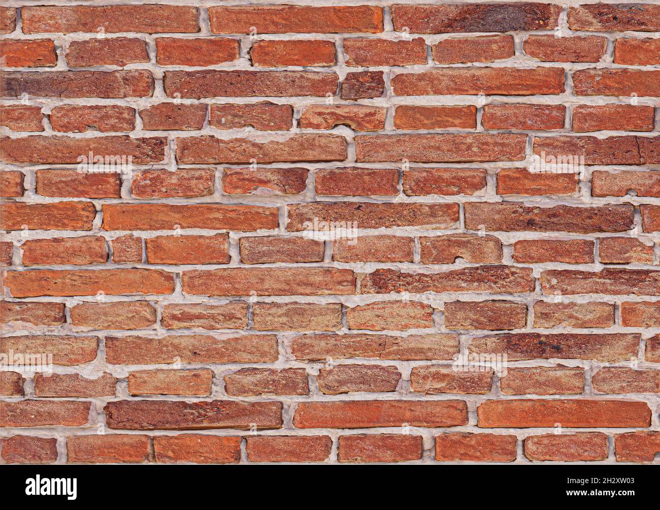 Background of old red grunge brick wall texture. high quality details Stock Photo