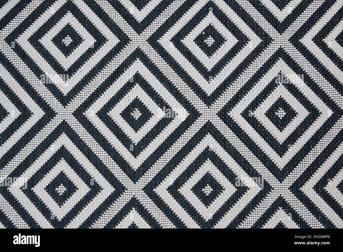 black and white pattern on a carpet as background photo Stock Photo