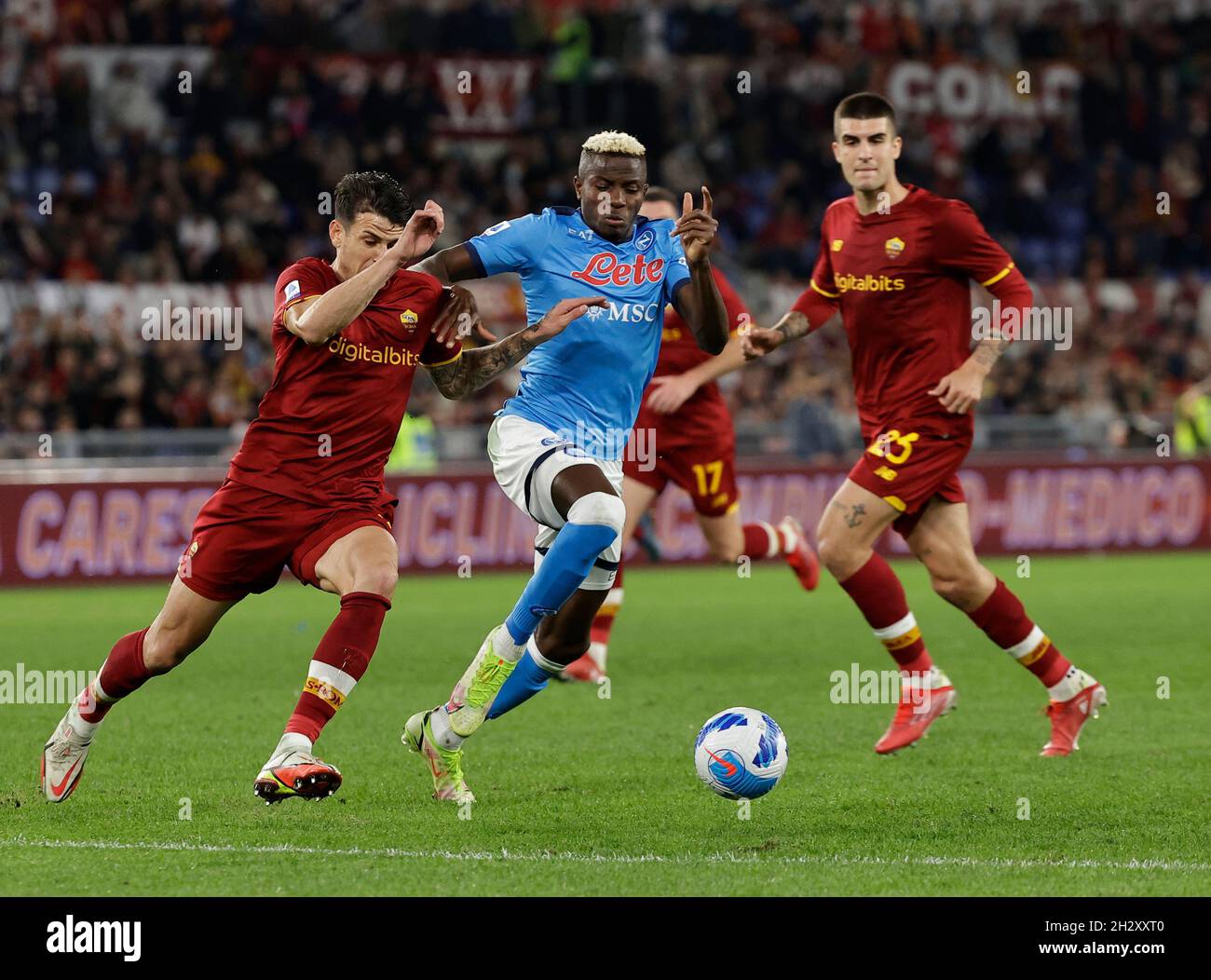 Stadio Olimpico, Rome, Italy. 24th Oct, 2021. Serie A football Roma v Napoli; Victor Osimhen of Napoli and Roger Ibanez da Silva of AS Roma Credit: Action Plus Sports/Alamy Live News Stock Photo