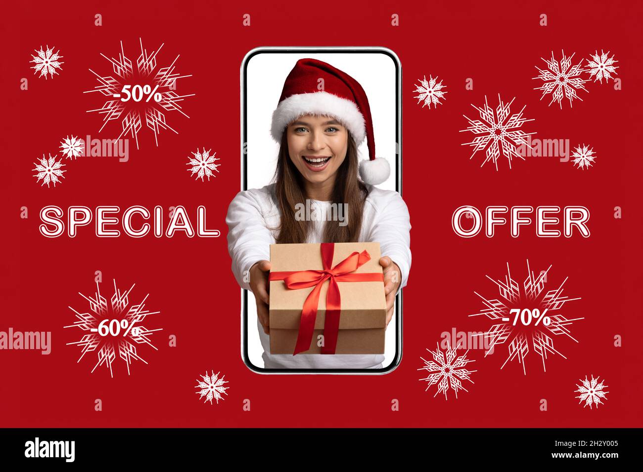 Special Offer. Woman Holding Gift Box Peeking Out Of Big Smartphone Screen Stock Photo