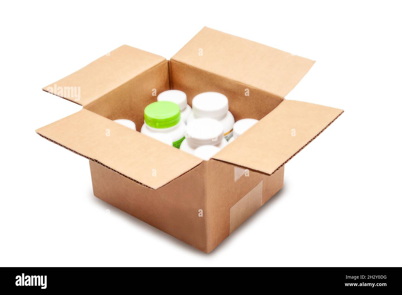 open cardboard box with bottles of medicines and vitamins isolated on