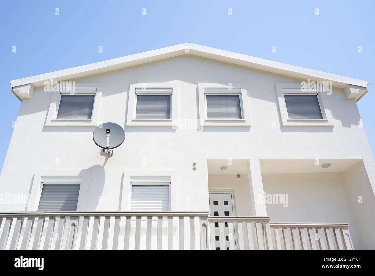 Roller shutters on all windows in a private house Stock Photo