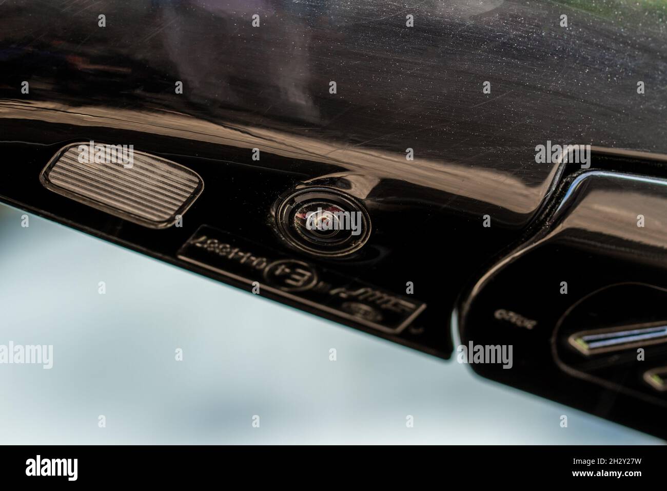 Close up view of surround view camera system on modern car side rear