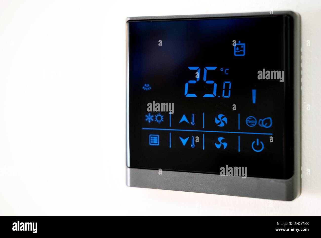 Wall mounted digital display of air conditioning system on white  background, equipment inside modern house, close up view. Modern  technology, comfort Stock Photo - Alamy