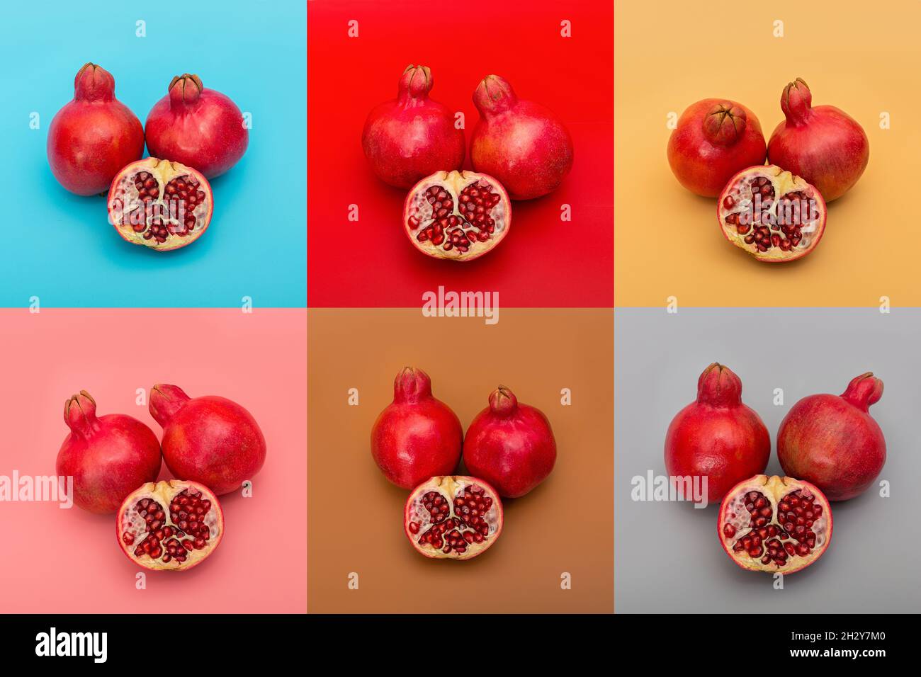 Pomegranate fruits on a bright, colored background Stock Photo