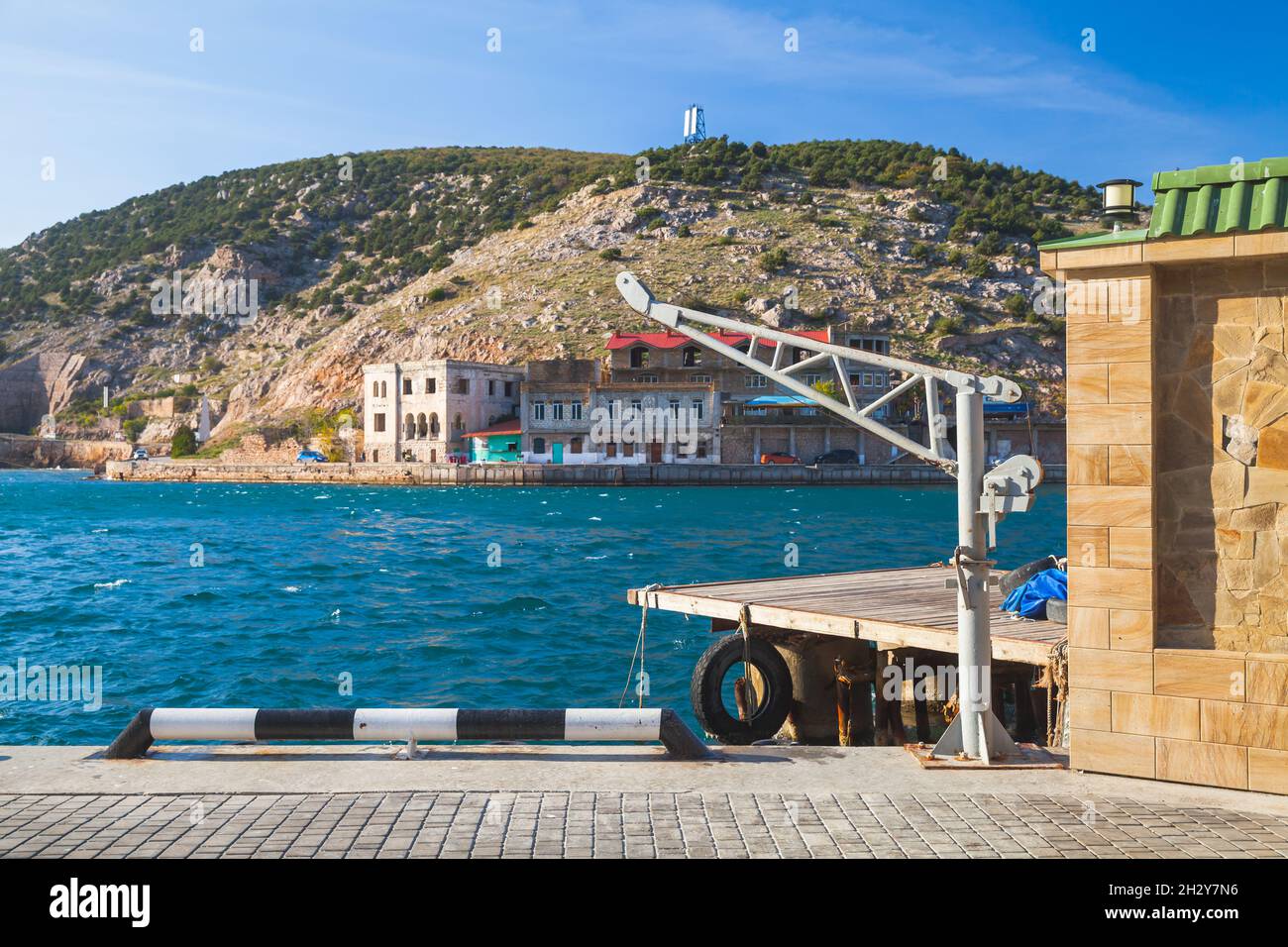 Crane lifting small boat hi-res stock photography and images - Alamy