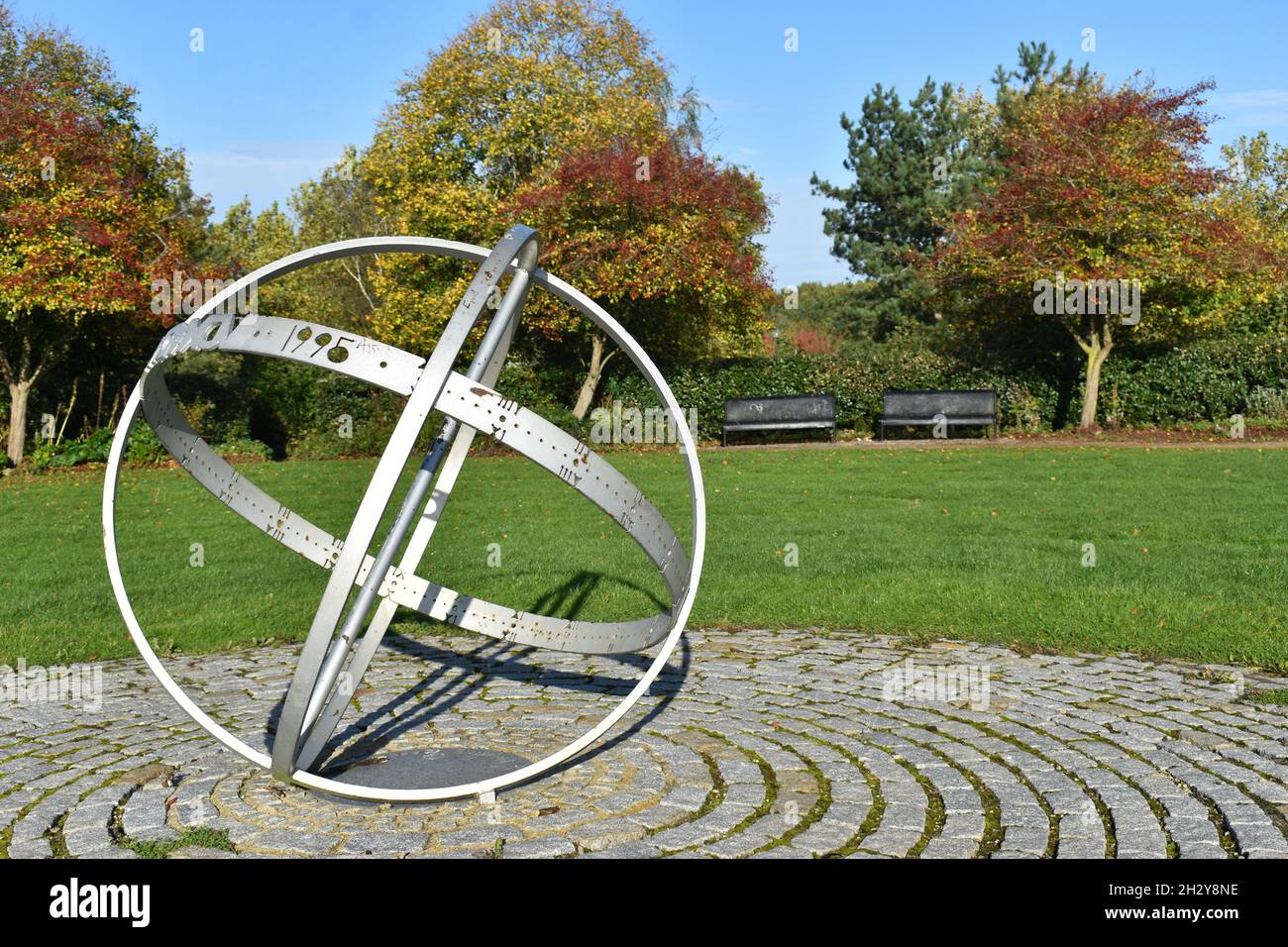 The 'Armillary Sphere' a sundial by Justin Tunley in Campbell Park, Milton Keynes, which celebrates the tenth anniversary of MK Housing Association. Stock Photo