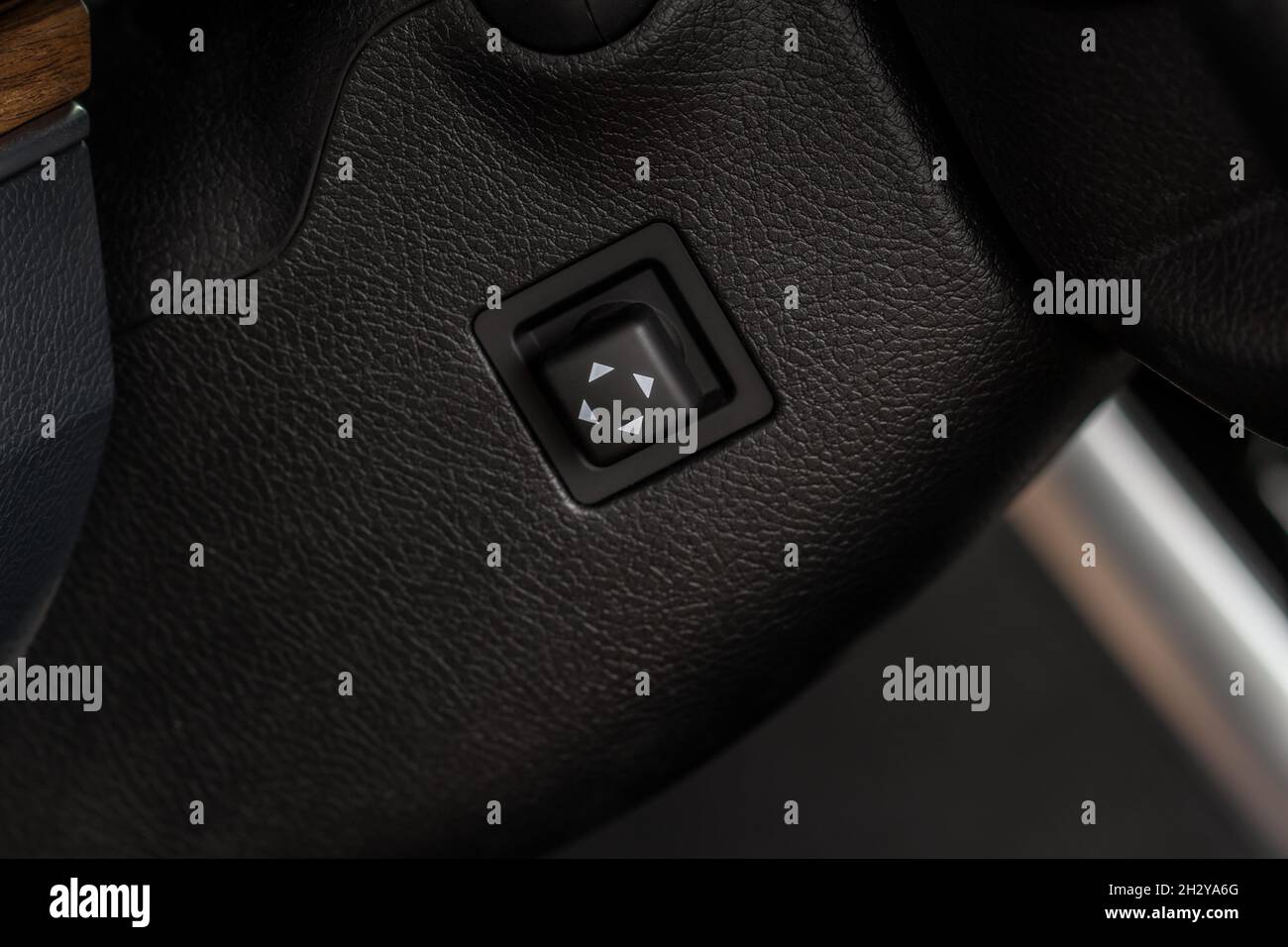 Adjustable steering wheel in modern car. Tilt and telescopic steering