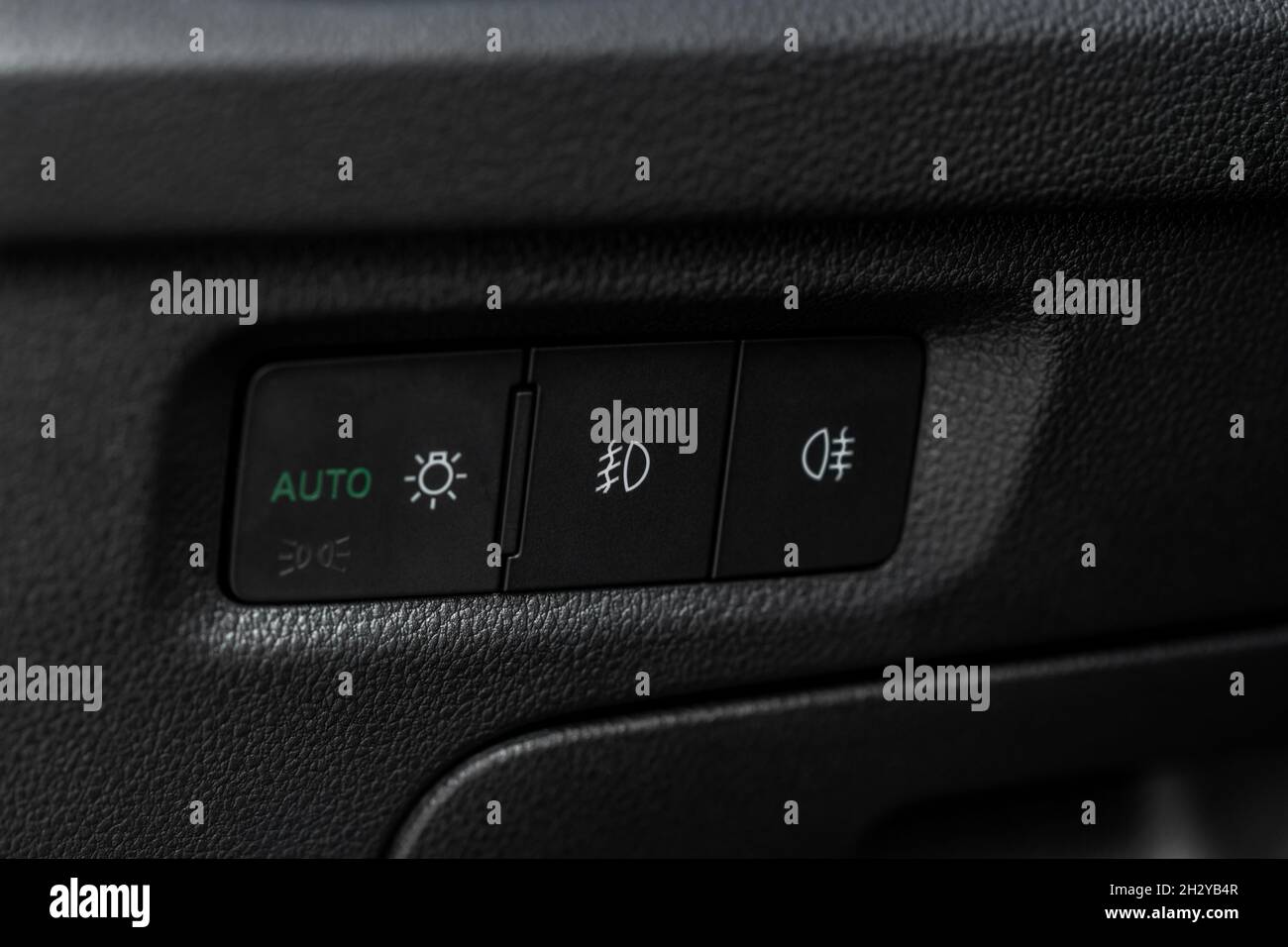 Car fog lights switch close up. Control switch power light system