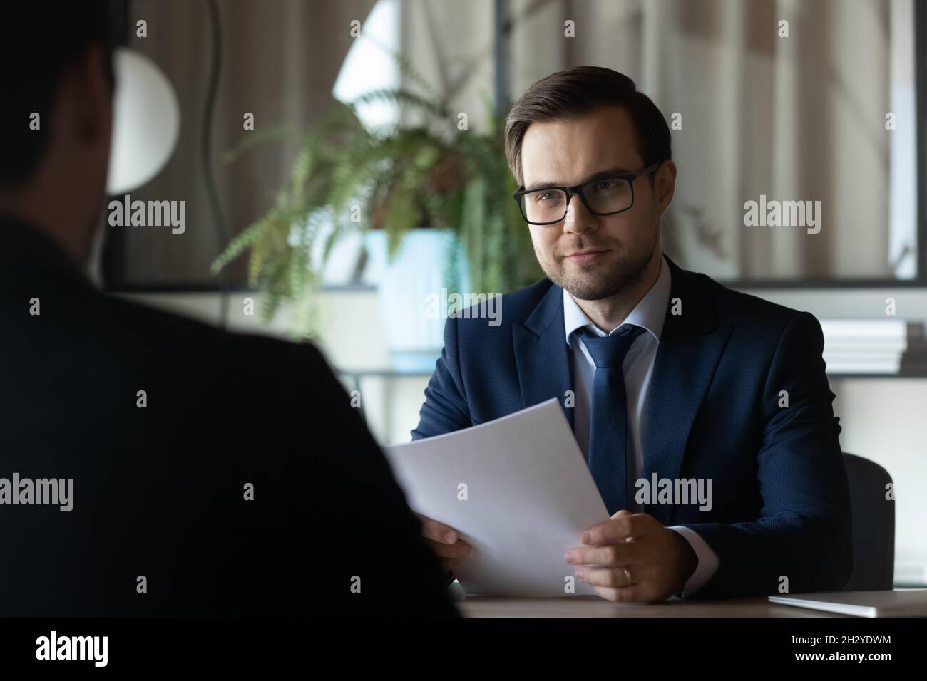 Male hr hold job interview with candidate on vacant post Stock Photo