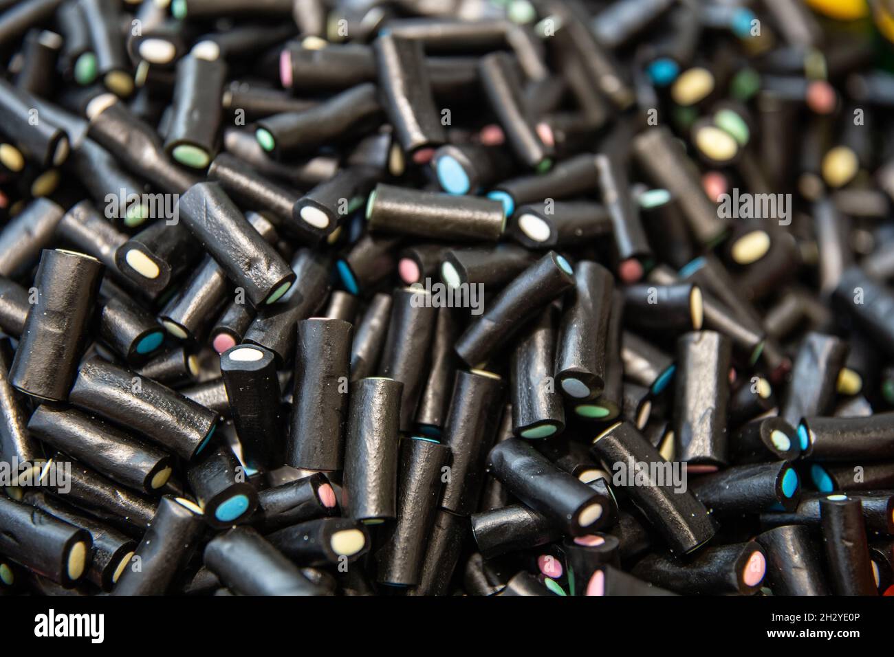 Jelly anise candy. Black licorice candies, top view Stock Photo Alamy