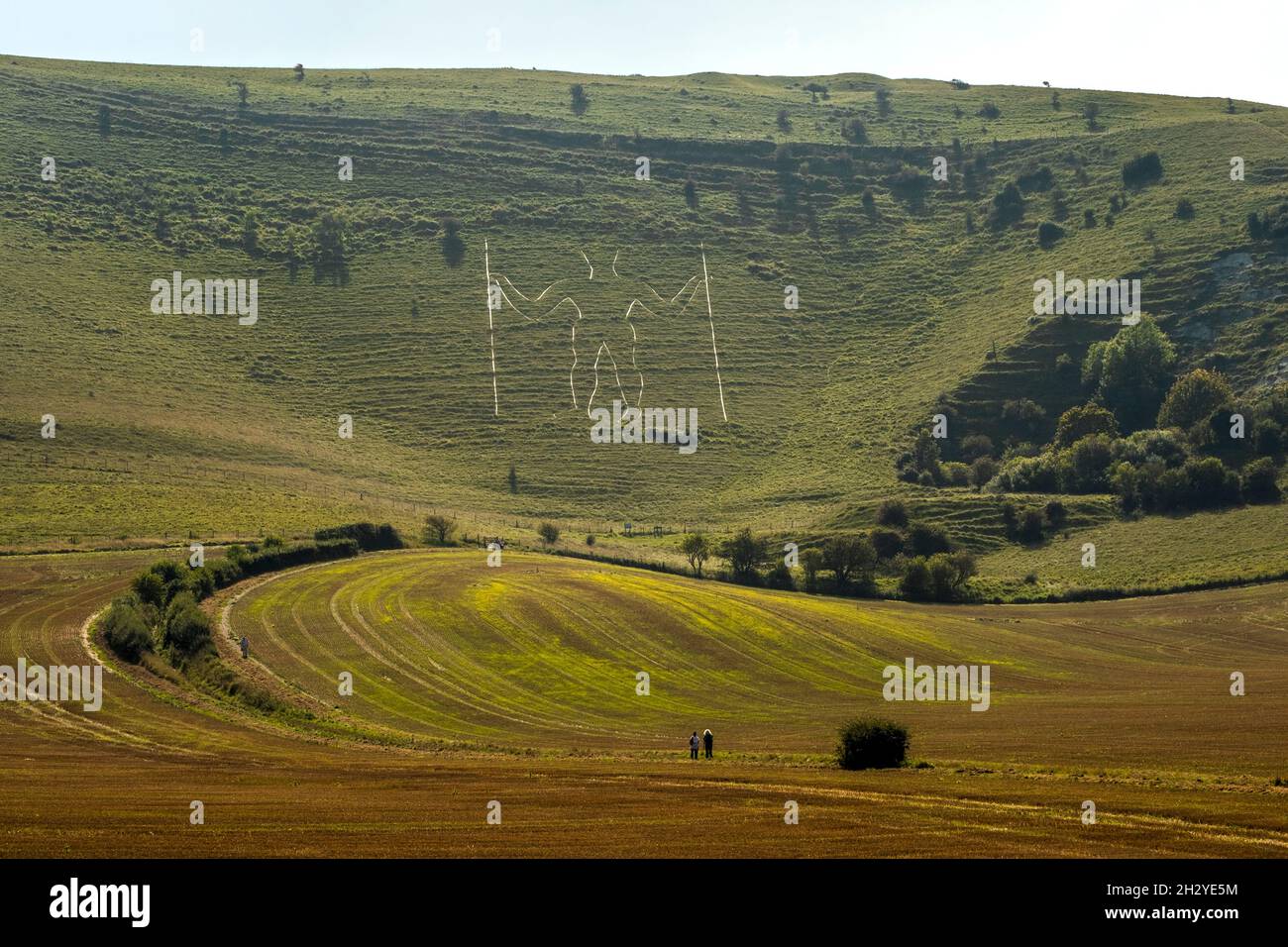 The Long Man of Wilmington carved in hills at Wilmington, East Sussex, UK. Stock Photo