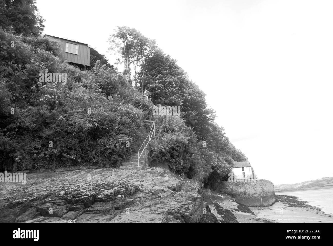 Dylan Thomas' last home, The Boathouse (below) and Writing Shed (above) in Laugharne, Carmarthenshire, Wales Stock Photo