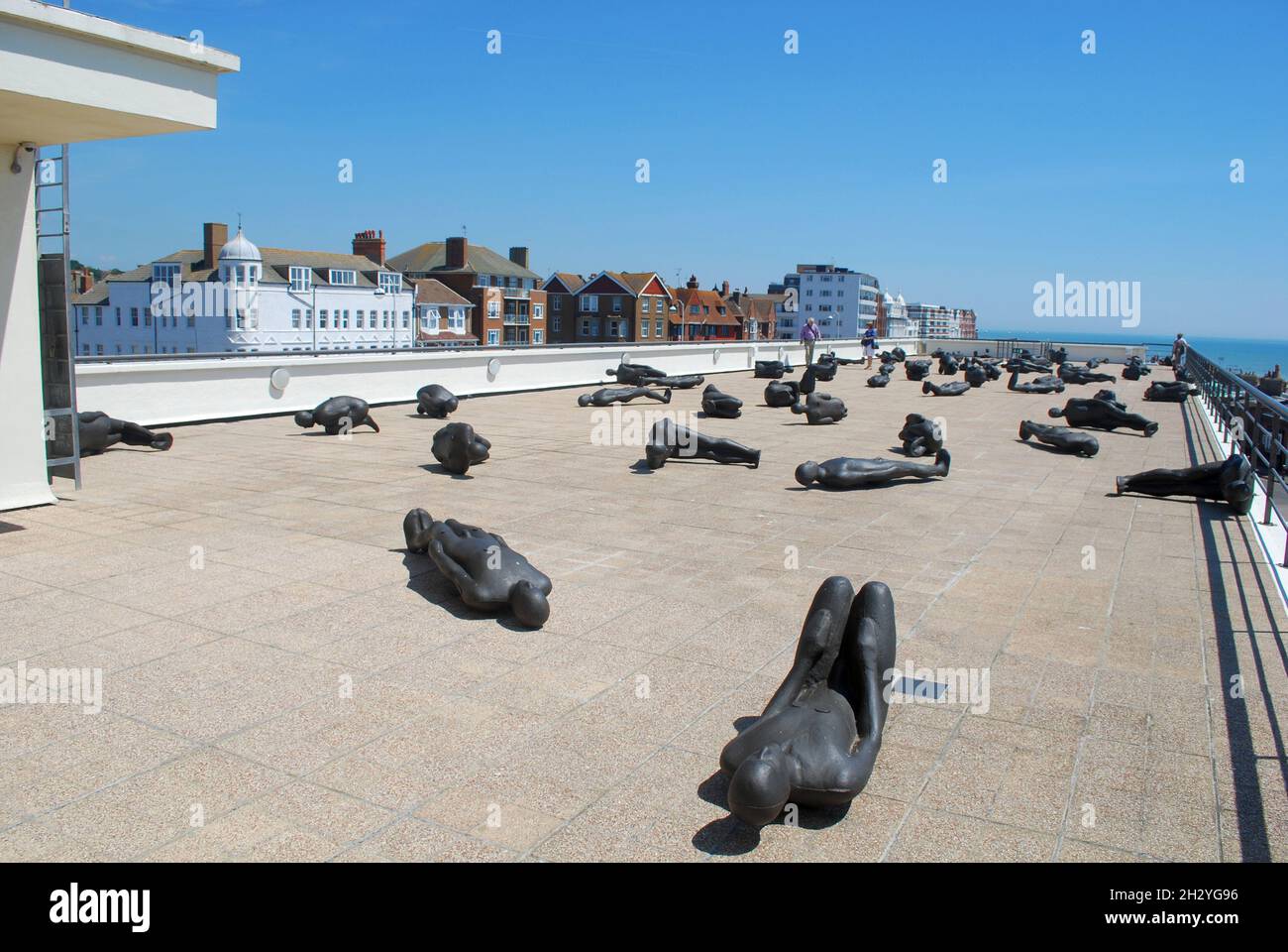 Antony Gormley's 'Critical Mass' installation on the roof of the magnificent Art Deco De La Warr Pavilion in Bexhill On Sea Stock Photo