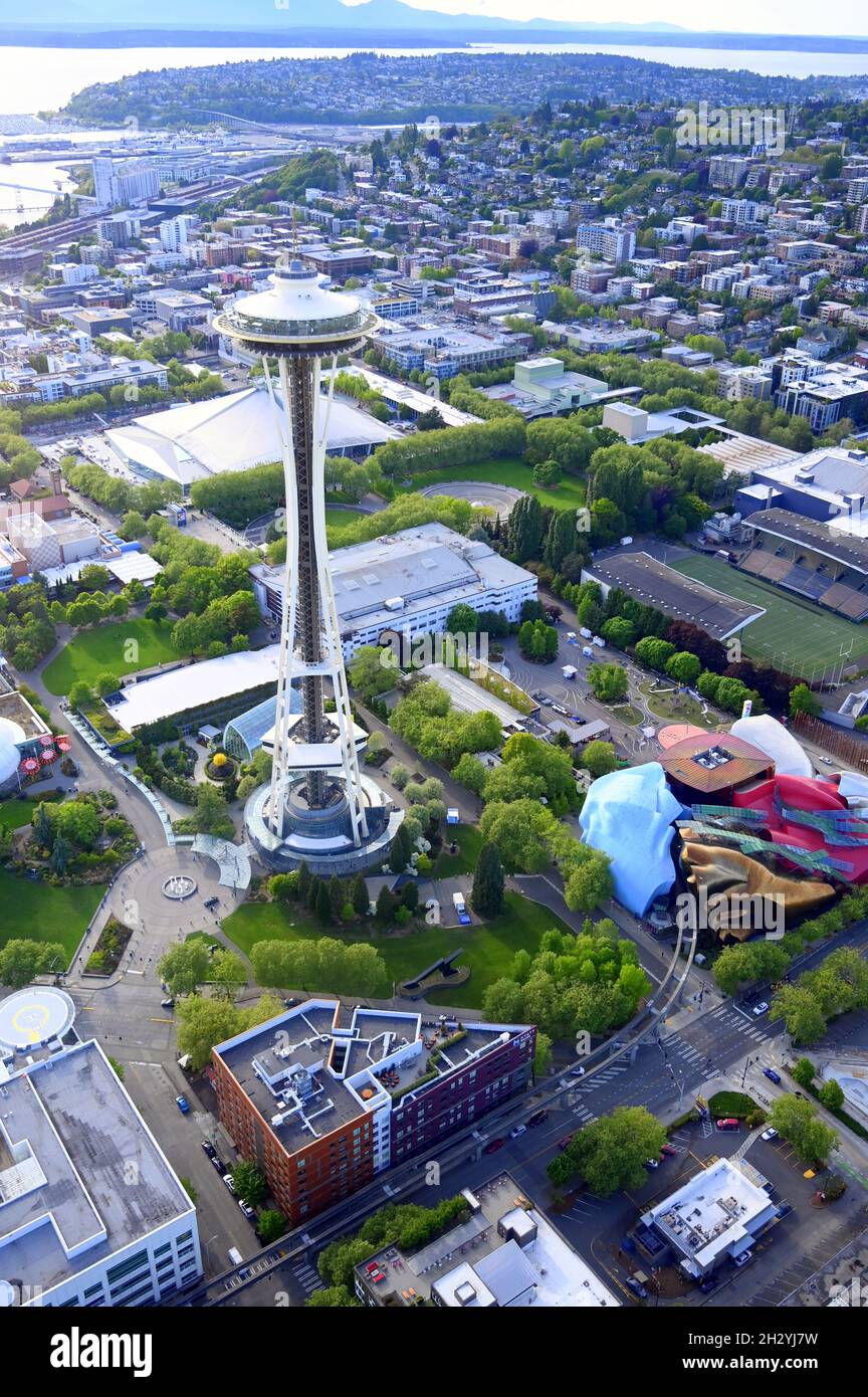 AERIAL VIEWS OF SEATTLE, WASHINGTON, USA...THE CITY, THE SPACE NEEDLE, AND THE COLORFUL MUSEUM OF POP CULTURE AT THE SEATTLE CENTER Stock Photo