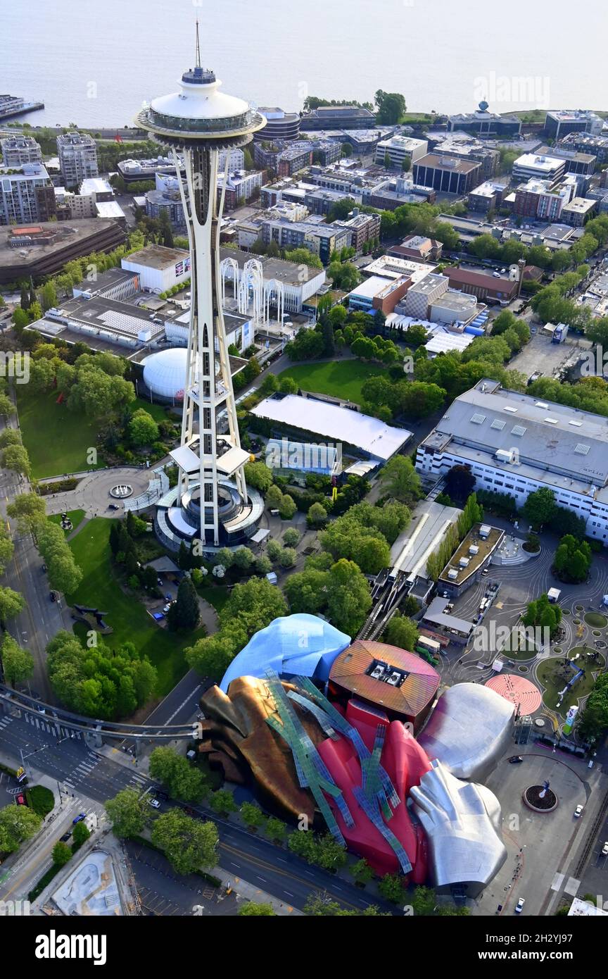 AERIAL VIEWS OF SEATTLE, WASHINGTON, USA...THE CITY, THE SPACE NEEDLE, AND THE COLORFUL MUSEUM OF POP CULTURE AT THE SEATTLE CENTER Stock Photo