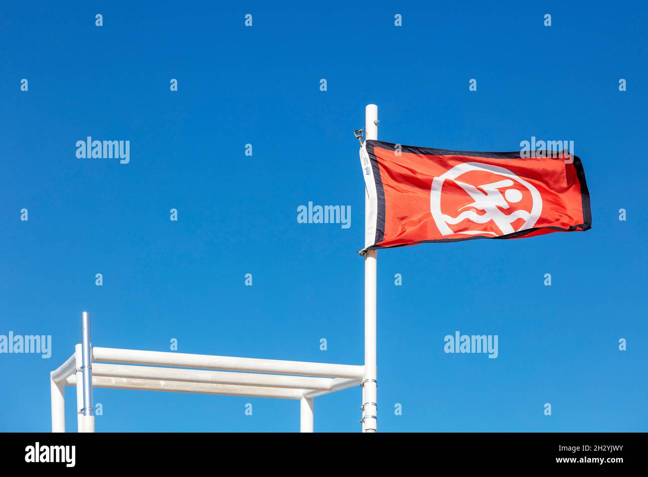 Beach warning flag, indicating high winds, surf, Great Lakes region, Michigan, USA, by James D Coppinger/Dembinsky Photo Assoc Stock Photo
