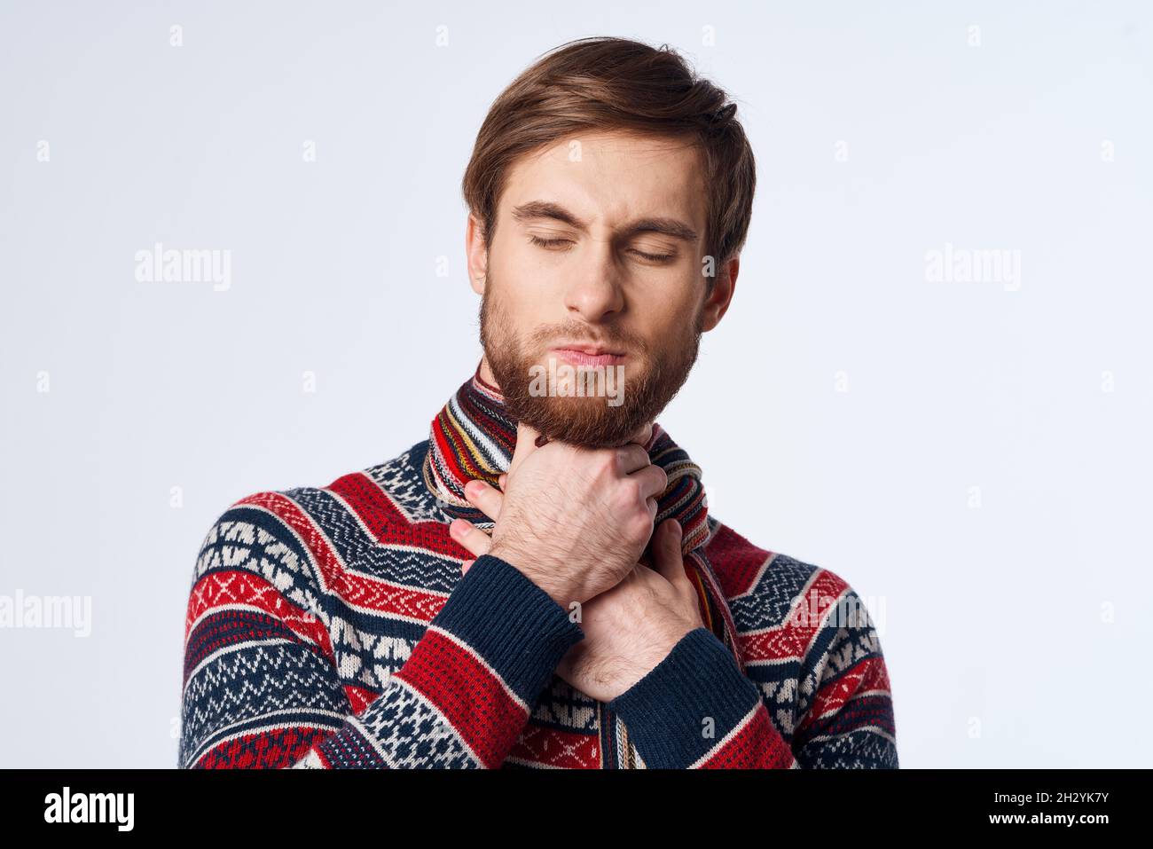 cold man in a scarf clings to the neck infection virus studio Stock ...